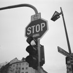 a black and white photo of a stop sign